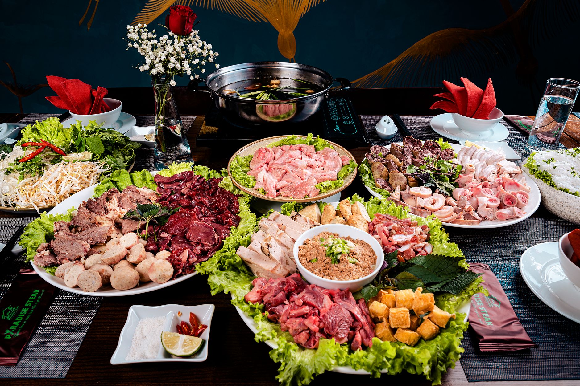 Assorted meats and vegetables spread for a hot pot meal