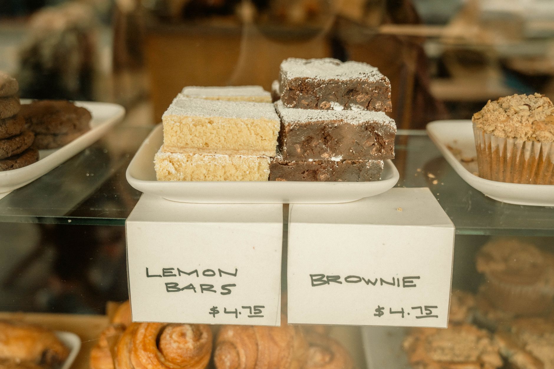 Assorted pastries in a bakery display case